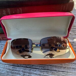 Kate Spade Women’s Sunglasses. Brown gradient. Fun blue and yellow stripe inside